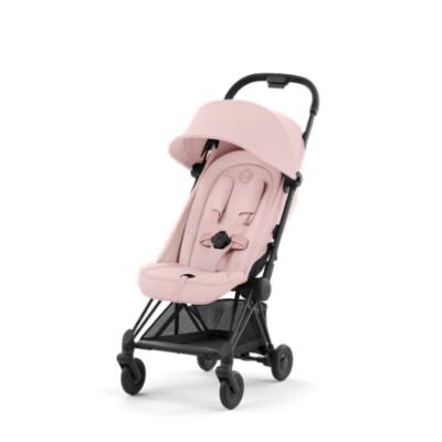 Cybex Coya Matkaratas - matt black/Peach Pink